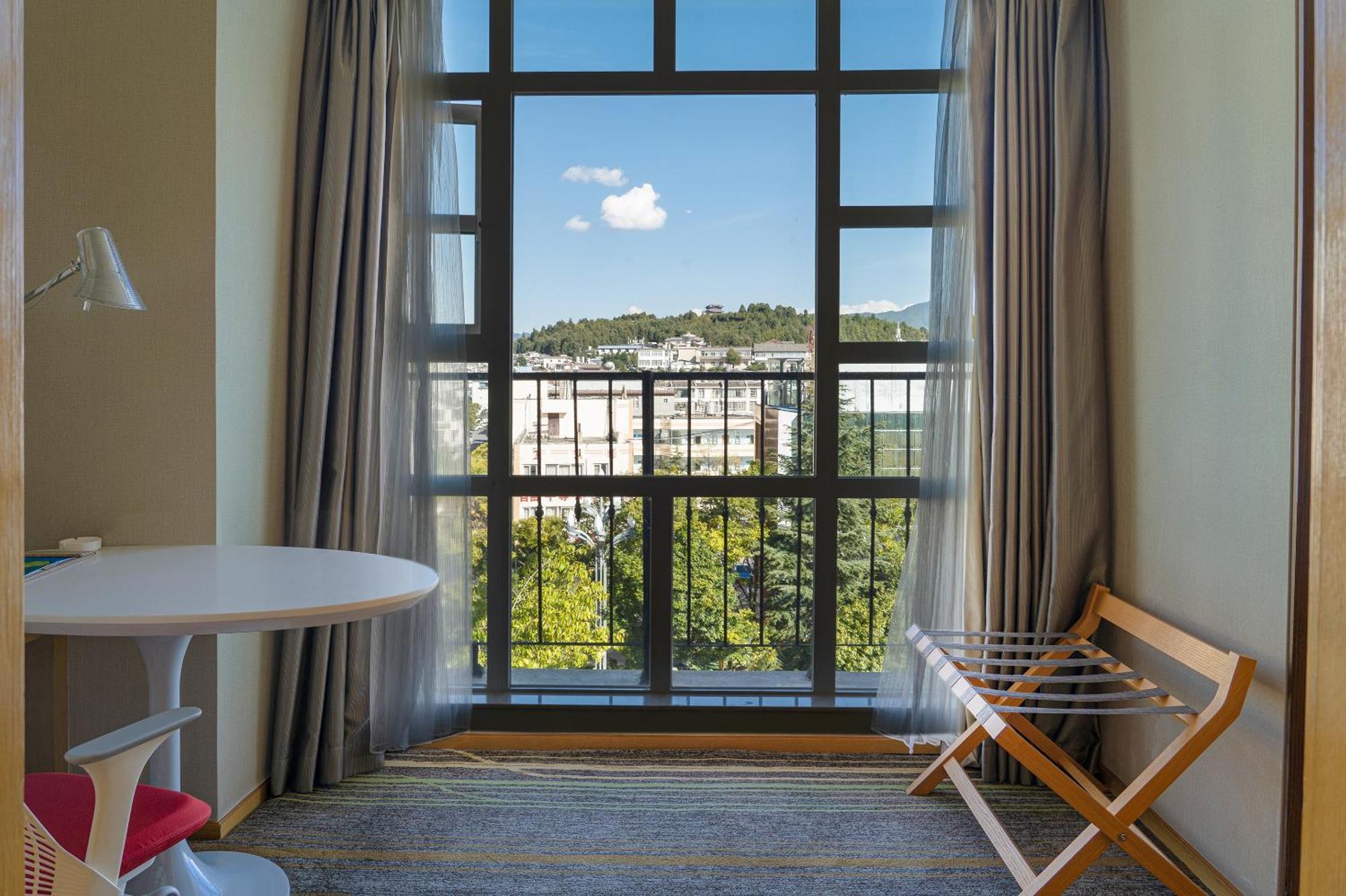 Hilton Garden Inn Lijiang Лицзян Экстерьер фото
