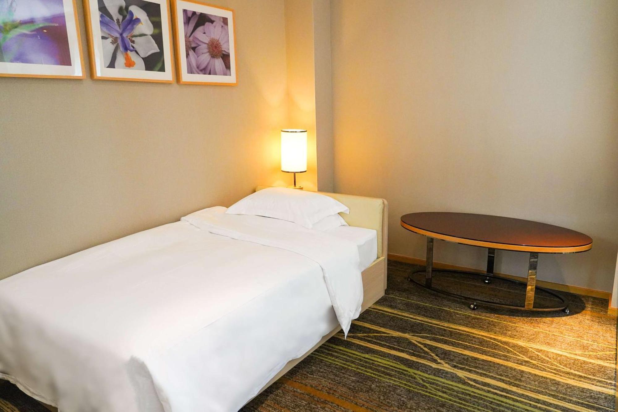 Hilton Garden Inn Lijiang Лицзян Экстерьер фото